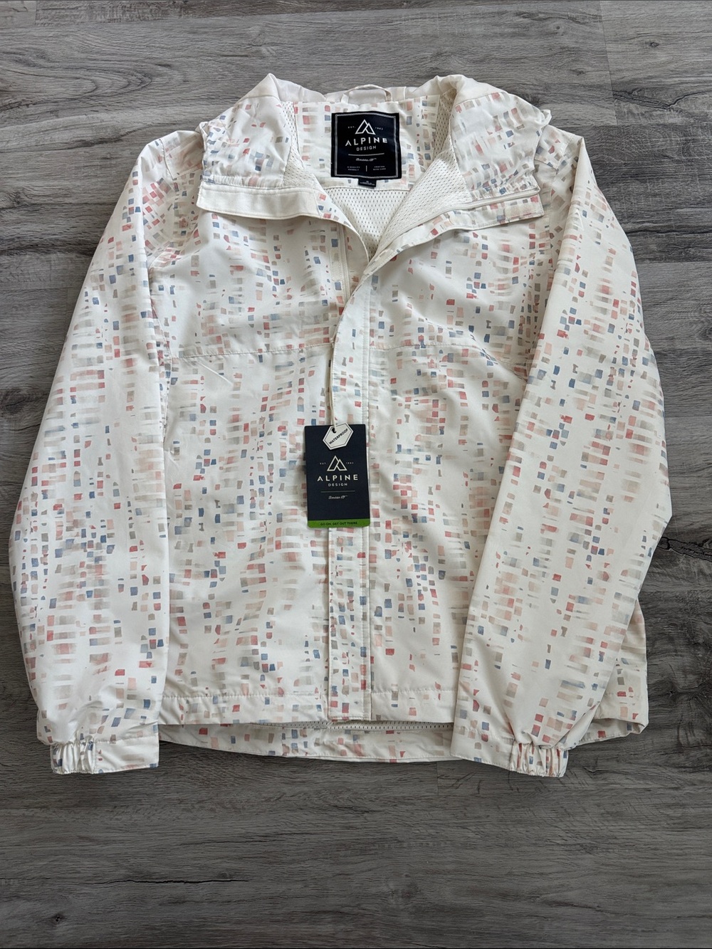 NWT - Alpine All Day Rain Jacket.